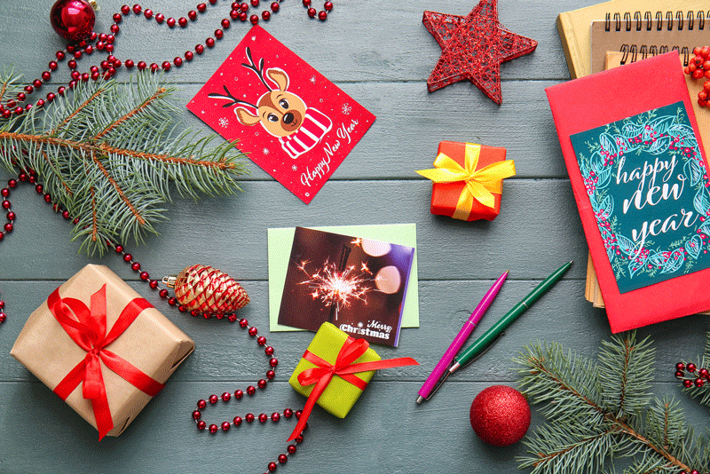 holiday greeting cards on table